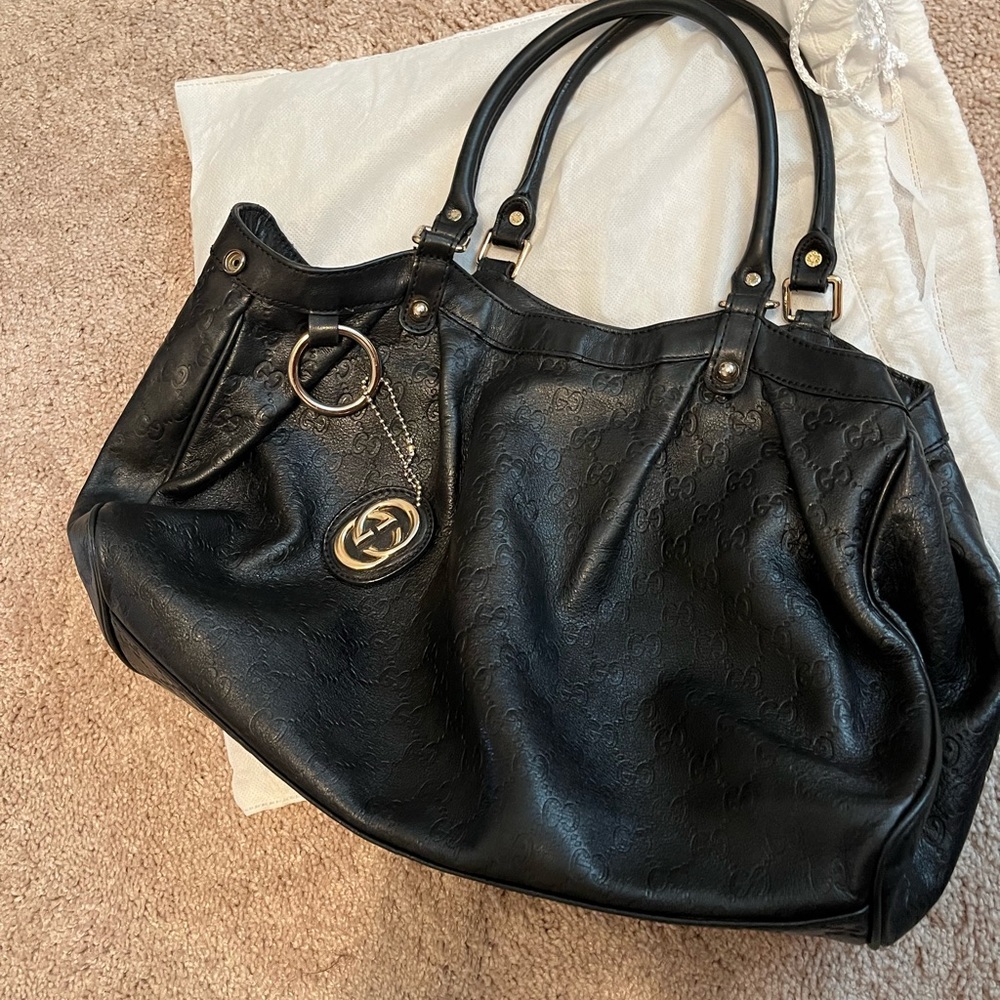 Gucci pre owned vintage good for every day use.